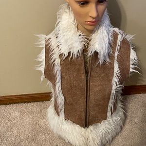 Bebe white and tan faux fur Vest. Size M.  A WOW AWE LOOK!!!